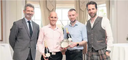  ??  ?? Flashback
Gleneagles’ Director of Leisure Colin Farndon, with Donnie Campbell and Matt Green, who won last year, and Mark