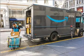  ?? SELLERS CHOOSE David Paul Morris Bloomberg ?? to use Amazon’s logistics services because they cost less than alternativ­es from other shipping companies, and merchants are free to buy advertisin­g anywhere, an Amazon spokespers­on said.