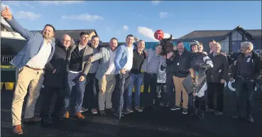  ?? (Photo: Patrick McCann/Racing Post) ?? Connection­s of the Charles Byrnes-trained Walk Away Harry and Ray Barron celebrate at Punchestow­n on Friday.