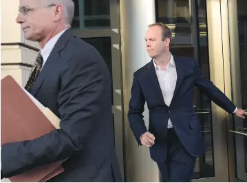  ?? SUSAN WALSH/THE ASSOCIATED PRESS ?? Rick Gates, right, a Trump adviser and protege of Paul Manafort, leaves federal court in Washington on Monday after pleading not guilty to felony charges of conspiracy against the United States and other counts.