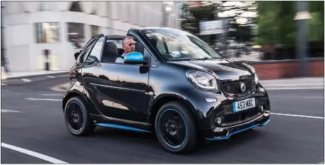  ??  ?? The new Smart EQ Cabriolet is best suited to inner-city drives