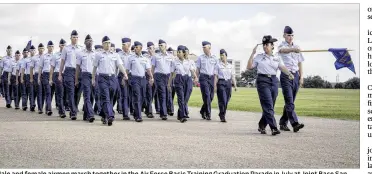  ?? JOSHUA RODRIGUEZ / U.S. AIR FORCE ?? Male and female airmen march together in the Air Force Basic Training Graduation Parade in July at Joint Base San Antonio-Lackland. Most of the victims of Tech. Sgt. Anthony Lizana’s misconduct were first-term female airmen out of high school,...