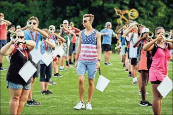  ?? / Rome City Schools ?? Section leader Cal Teems observes his crew during Rome High band camp, which is continuing through July 20.