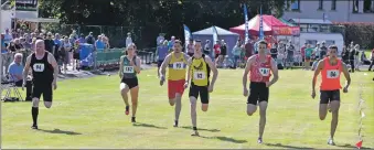  ??  ?? Greg Kelly, number 86, from East Kilbride took the 100m handicap title.