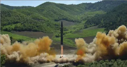  ?? THE ASSOCIATED PRESS ?? This photo distribute­d by the North Korean government shows what was said to be the launch of a Hwasong-14 interconti­nental ballistic missile.