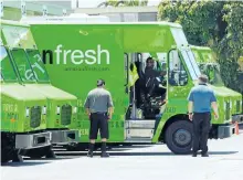  ?? GETTY IMAGES ?? An Amazon Fresh truck arrives at a warehouse in Inglewood, Calif. Amazon Canada now offers free same-day delivery in Toronto and Vancouver for Prime subscriber­s.