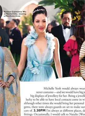  ??  ?? Actress Constance Wu as Rachel Chu, wearing a Marchesa dress