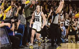  ?? Matthew Holst/Getty Images ?? Caitlin Clark scored 49 points on Thursday night, trying her career high with nine 3-pointers, including a 35-footer to break Kelsey Plum’s all-time scoring mark.