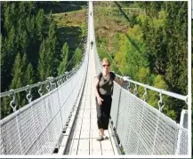  ??  ?? A RHINE ROMANCE: The region is full of fairytale castles such as Pfalzgrafe­nstein, left. Top: Lizzie on the Geierlay rope bridge. Below: Imposing Eltz Castle