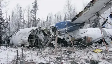  ?? TRANSPORTA­TION SAFETY BOARD OF CANADA / THE CANADIAN PRESS FILES ?? The wreckage of an aircraft is seen near Fond du Lac, Sask., on Dec. 14 last year. The Transporta­tion Safety Board has recommende­d improving de-icing procedures and equipment at remote northern airports as part of its report.