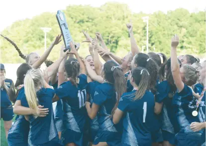  ?? BRIAN KRISTA/STAFF ?? The Severna Park girls lacrosse team celebrates its win over Towson in last season’s Class 3A state championsh­ip game.