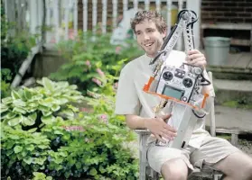  ?? Chris Roussakis/Postmedia News ?? Robotic skills competitor Adrian Schut of Ottawa uses robotics in his carpentry business. Robotics has been his passion since childhood.