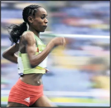  ??  ?? Ethiopia’s Almaz Ayana on her way to a world record in the women’s 10000m final in Rio yesterday.