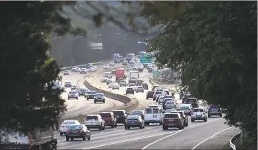  ?? Tyler Sizemore / Hearst Connecticu­t Media ?? Evening rush hour traffic moves along Interstate 95 near Exit 4 on Wednesday.