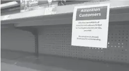  ?? ERIC GAY/AP ?? Shelves typically stocked with baby formula sit mostly empty Tuesday at a store in San Antonio. Parents across the U.S. are scrambling to find baby formula because supply disruption­s and a massive safety recall have swept many leading brands off store shelves.