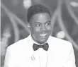  ?? MARK RALSTON, AFP/GETTY IMAGES ?? Chris Rock rocked his hosting duties at the Oscars Sunday.