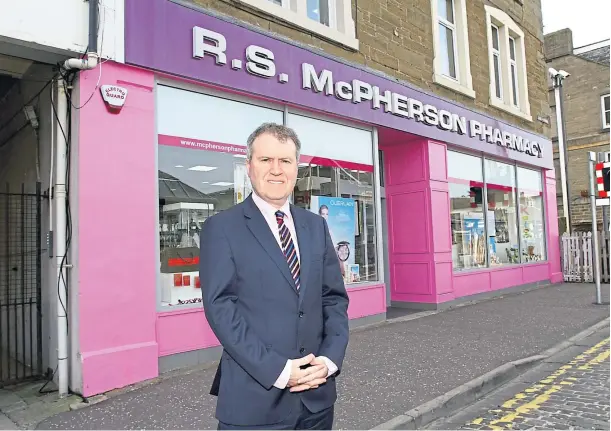  ??  ?? GROWTH: Davidsons Chemists managing director Allan Gordon outside one of the firm’s acquisitio­ns – RS McPherson Pharmacy in Broughty Ferry.