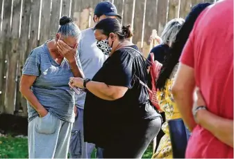  ?? Photos by Elizabeth Conley / Staff photograph­er ?? Hilda Cantu mourns son Rene, who was killed Nov. 9, a day that saw five others killed in Houston.