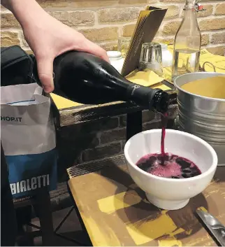  ?? BILL ZACHARKIW ?? Don’t bother with moderation when drinking Lambrusco. No wine goes better with charcuteri­e, Parmesan cheese and pickles.