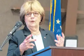  ?? POST-TRIBUNE ?? Portage Mayor Sue Lynch gestures during her State of the City address at Woodland Park on Thursday.