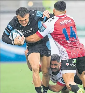  ?? ?? Glasgow’s Cole Forbes is tackled by Lions’ Stean Pienaar at Scotstoun yesterday
