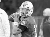  ?? AL DIAZ/STAFF PHOTOGRAPH­ER ?? Malik Rosier will be under center when Miami welcomes Bethune-Cookman to Hard Rock Stadium for its opener.