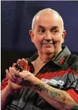  ?? Foto: dpa ?? Der erfolgreic­hste Darts Spieler der Ge schichte: Phil Taylor.