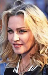  ??  ?? In this, file photo, musician Madonna poses for photograph­ers upon arrival at the World premiere of the film "The Beatles, Eight Days a Week" in London. — AFP