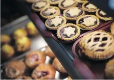  ??  ?? Freshly baked desserts are on display at Blak’s Bakery on Thursday.