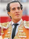  ??  ?? FATAL ATTRACTION: Outnumbere­d by fighters, a bull is taunted in Granada’s Plaza de Toros. But the ‘cultural treasure’ has now claimed the lives of Victor Barrio, left, and Ivan Fandino