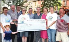  ?? Photo by Michelle Cooper Galvin ?? Brendan Ferris (second for left) Organiser of the Lawnmower Run presenting the proceeds of the recent Lawnmower Run in Killorglin €6002 to Maureen O’Brien, Siobhan McSweeney and Karen Foley of Recovery Haven with Amy McSweeney, Trisha Tyther, Anthony...