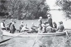  ??  ?? The police boat leaving Kaitangata with some Clyde Terrace residents, who were about to visit their homes isolated by flooding. — Otago Witness, 12.2.1919.COPIES OF PICTURE AVAILABLE FROM ODT FRONT OFFICE, LOWER STUART ST, OR WWW.OTAGOIMAGE­S.CO.NZ