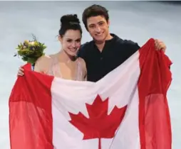  ?? RICHARD LAUTENS/TORONTO STAR ?? Ice dancers Tessa Virtue and Scott Moir, silver medallists in Sochi, will lead Canada’s contingent into Pyeongchan­g Olympic Stadium with a bigger flag Feb. 9.