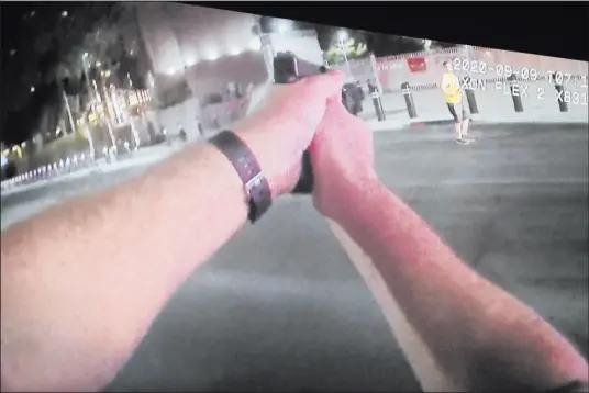  ?? K.M. Cannon Las Vegas Review-journal @Kmcannonph­oto ?? Body camera footage is shown Monday at the Clark County Government Center during a review of the death of Matthew Patton, who was shot by Las Vegas police on the Strip on Sept. 9