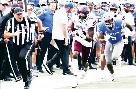  ?? ?? Mississipp­i State cornerback Emmanuel Forbes (13) returns an intercepti­on against Memphis last season. (Photo by Mansel Guerry, MSU Athletics, SDN file)