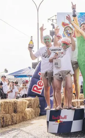  ?? Picture: Wayne Reiche ?? The Red Bull Box Cart Race winners on the podium.