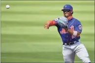  ?? Mark Brown / TNS ?? Francisco Lindor of the New York Mets makes the throw to first base for the out in the fourth inning against the Miami Marlins in a spring training game at Roger Dean Chevrolet Stadium on March 1 in Jupiter, Fla.