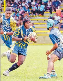  ?? ?? Apisai Vakavanua on attack for Waidalice Blues against Dominion Brothers during the Fiji Bitter Nawaka 7s youth competitio­n at Prince Charles Park in Nadi yesterday.