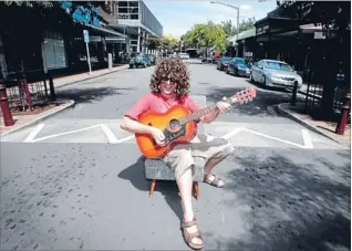  ?? Photo: MURRAY MILSON/FAIRFAX NZ ?? Guitar hero: Craig Johnston, aka Bing Turkby, is among the artists taking part in a music festival in George St and Coleman Mall, Palmerston North.