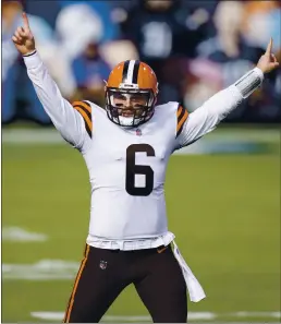  ?? BRETT CARLSEN — THE ASSOCIATED PRESS ?? Browns quarterbac­k Baker Mayfield had a lot to celebrate Sunday as he passed for a season-high 334 yards and four touchdowns in a 41-35 victory against the Titans.