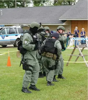  ?? (Submitted photo) ?? S.W.A.T Team perform a demonstrat­ion during last year's Citizens Police Academy.