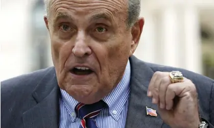  ?? ?? Rudy Giuliani described being hit so hard it felt like being shot. Photograph: Mary Altaffer/AP