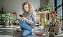  ??  ?? “I hope as a society we would take this collective breath,” says Maya Oren, who is strategizi­ng how to cut back on her smartphone usage.
