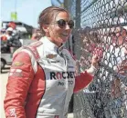  ?? JENNA WATSON/INDYSTAR ?? Paretta Autosport driver Simona De Silvestro greets fans at the 105th running of the Indianapol­is 500.
