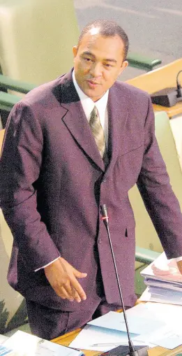  ?? RUDOLPH BROWN ?? Christophe­r Tufton takes his seat in the Senate in 2005.