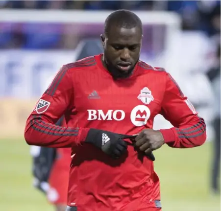  ?? RYAN REMIORZ/THE CANADIAN PRESS ?? Toronto FC forward Jozy Altidore leaves the pitch after the Reds’ disappoint­ing playoff effort against the Impact in Montreal on Thursday night.