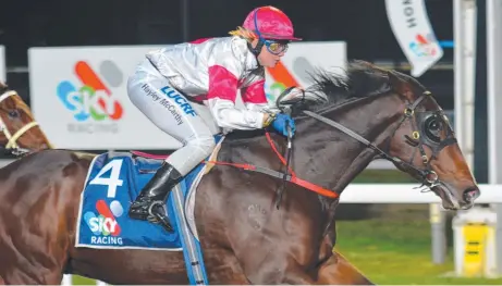  ?? Picture: TASRACING ?? LOVING IT: Zatacla (Hayley McCarthy) powers to the line in Launceston on Tuesday night.