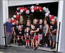  ?? ?? A ribbon cutting in September celebrated the rebranding and opening of Bear’s Den Fitness in Boyertown.