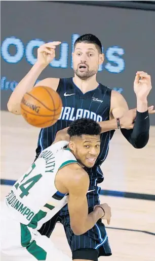  ?? ASHLEY LANDIS/AP ?? Magic center Nikola Vucevic said his team must play from ahead — like it did in Game 1 — to beat Giannis Antetokoun­mpo and the Milwaukee Bucks in Game 5 and extend the best-of-seven series.