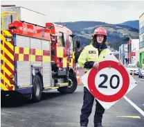  ?? PHOTO: PETER MCINTOSH ?? No need for speed . . . Dunedin senior firefighte­r Blair Harcus wants people to slow down around emergency scenes, to avoid endangerin­g firefighte­rs.